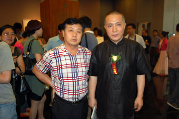 著名画家周京新与总编杨沐鸣娱乐合影