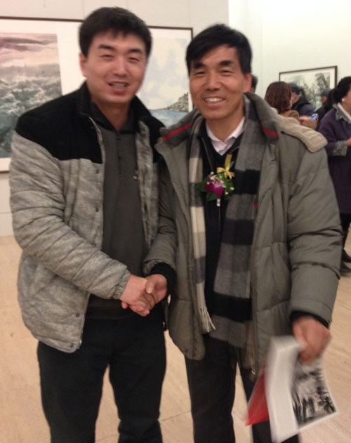 中央统战部光彩事业指导中心主任余敏安与林少云端合影