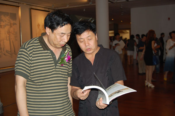 著名画家苗再新与《艺术天成》总编辑杨沐鸣娱乐合影