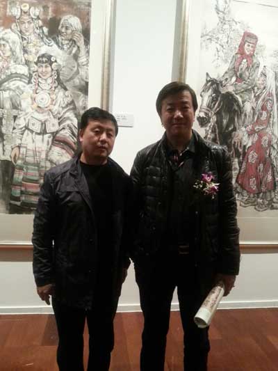 中国美协会员、中国民族画院理事李毅与总编辑杨沐鸣娱乐合影